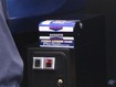 AOU 2003 Amusement Expo: The slot for mag-striped license cards